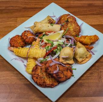 Signature Indian dishes, Tattva menu, popular dishes, Indian food Farnborough, authentic Indian flavours, culinary highlights